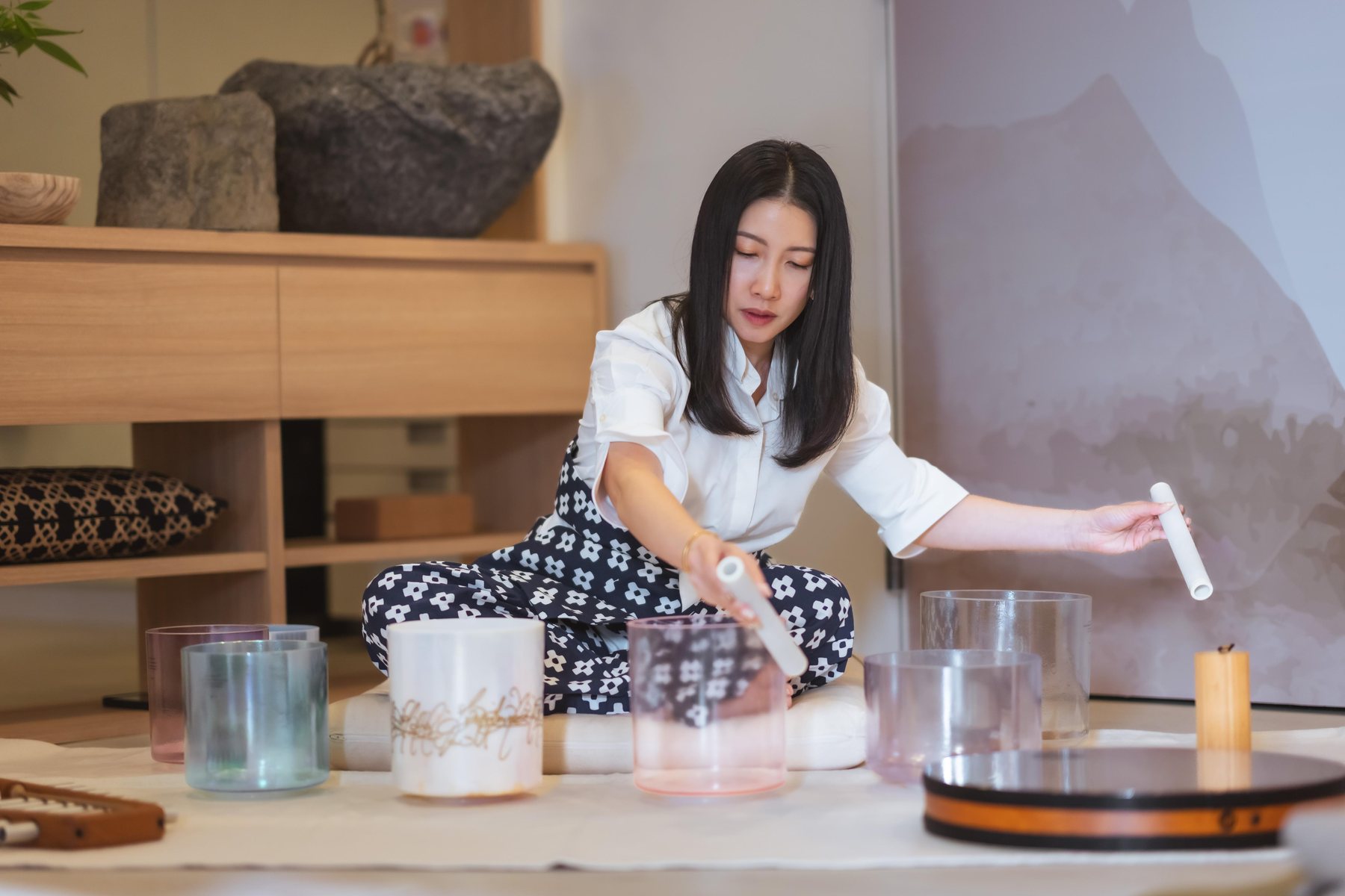 Hands on a crystal bowl